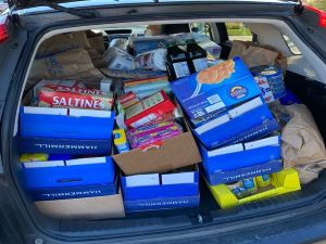 thanksgiving food drive donations in trunk of car