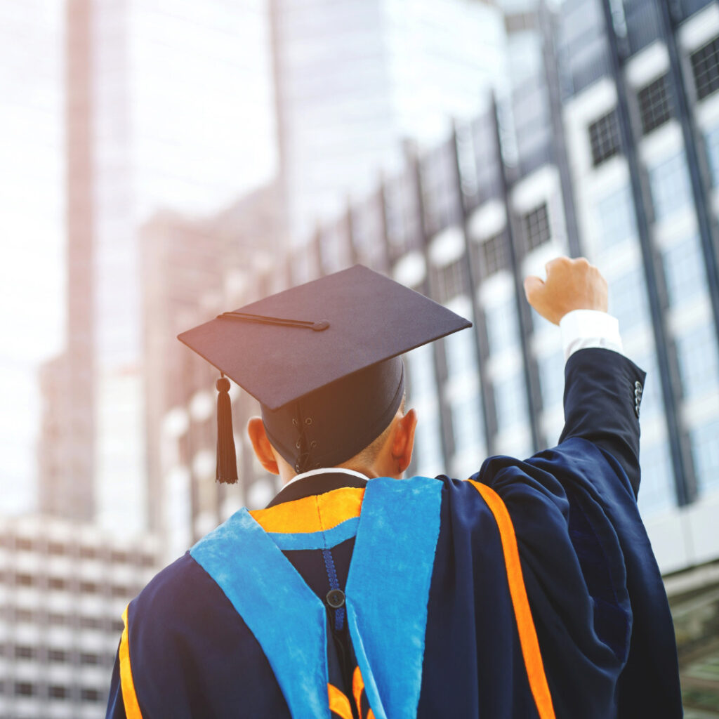 A college graduate in a cap and gown