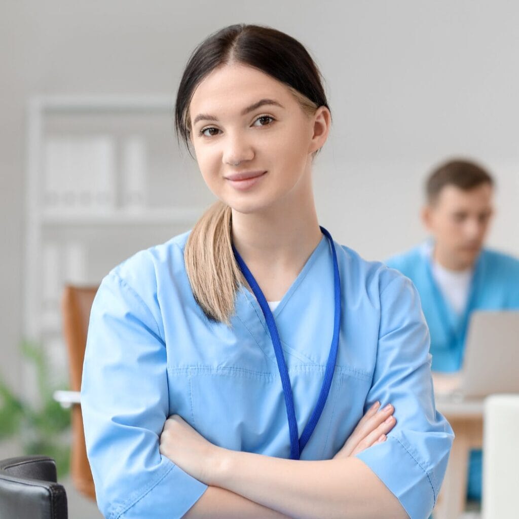 A physician assistant smiling at the camera