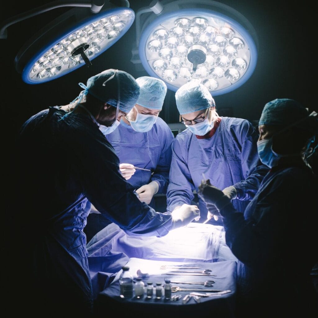 Surgeons working on a patient for a blog on Top Surgical Specialties by Pay