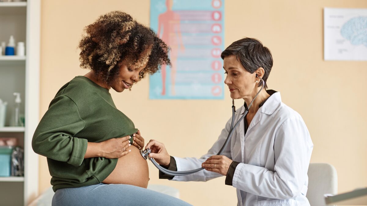 A maternal-fetal medicine specialist working with a patient