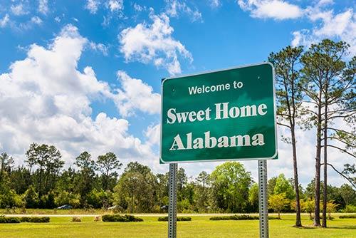 A sign welcoming you to Alabama